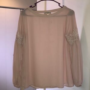 Blush color, long sleeve blouse.